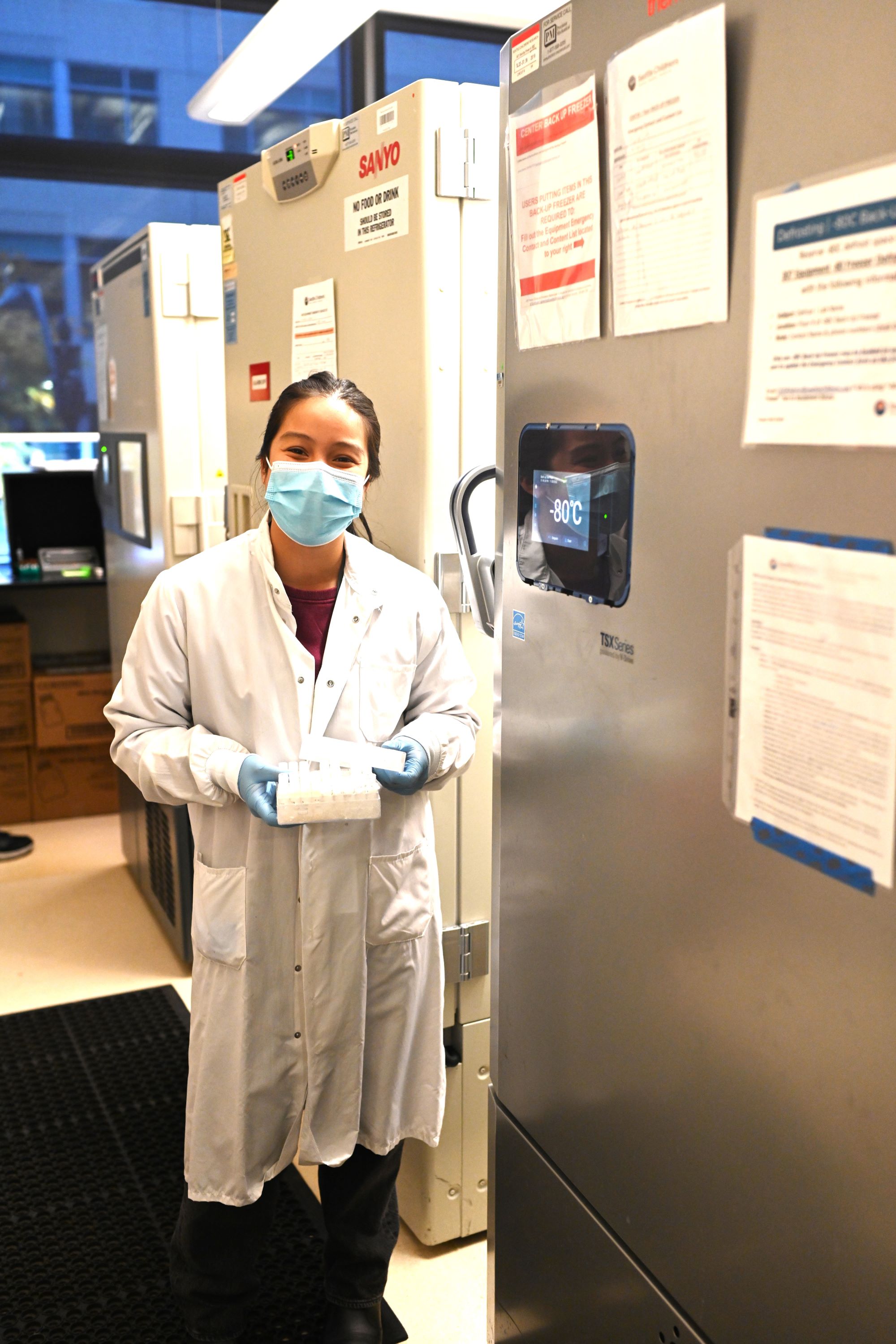 student in lab coat