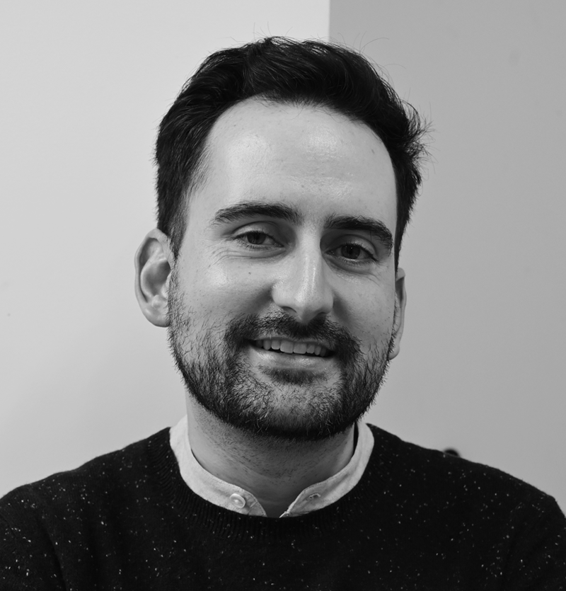 black and white headshot photo of Mike Frick